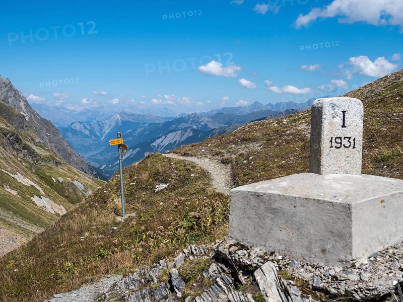 Hiking path, pass petit col Ferret, border Switzerland-Italy, signposts, view towards Val de Ferret, Switzerland, Europe