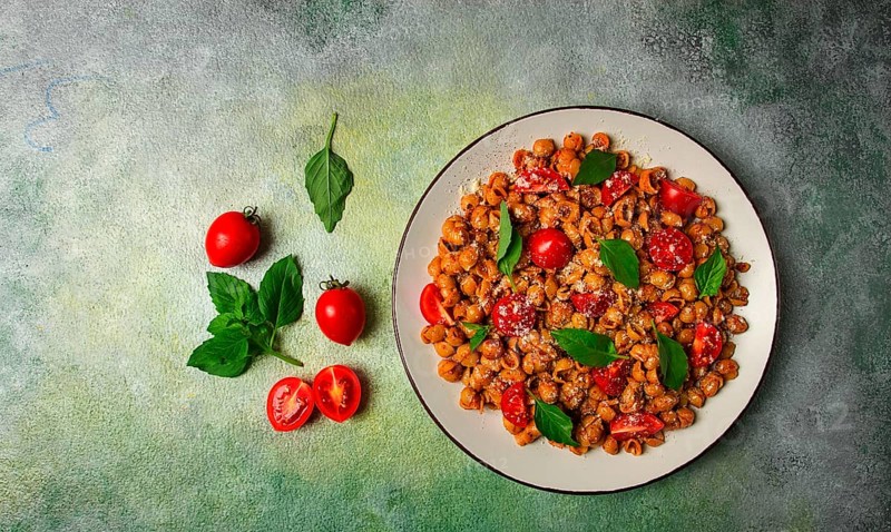Tuscan pasta with smoked paprika and basil, parmesan cheese, Italian traditional cuisine