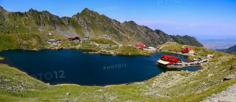 Romania: Lake Balea (Romanian: Balea Lac) from above. The lake is located at the summit of the Transfogarasch High Road in the Fogarasch Mountains on the border between Transylvania and Wallachia and is a popular excursion destination