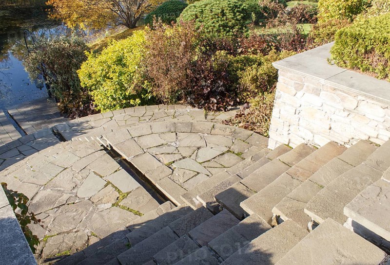 Cottage garden with stone stairs and retaining wall, Modern landscape design