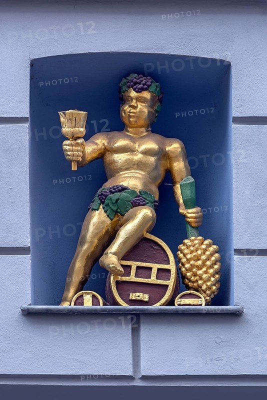 Bacchus figure in a niche of a residential building, Wismar, Mecklenberg-Western Pomerania, Germany, Europe