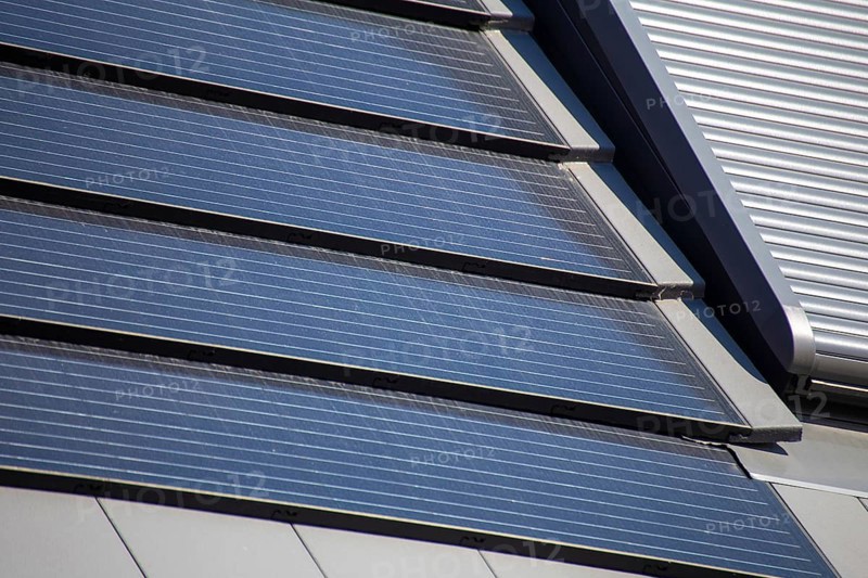 Close-up of a roof with photovoltaic tiles as an attractive alternative to conventional solar roofs