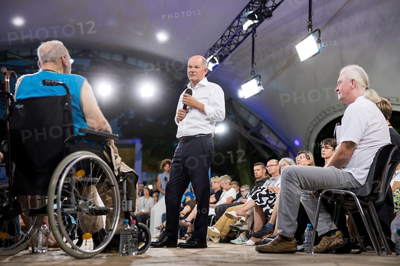 Olaf Scholz (Chancellor of the Federal Republic of Germany, SPD) surrounded by guests at the Chancellor's meeting at ufaFabrik in Berlin on 4 September 2024