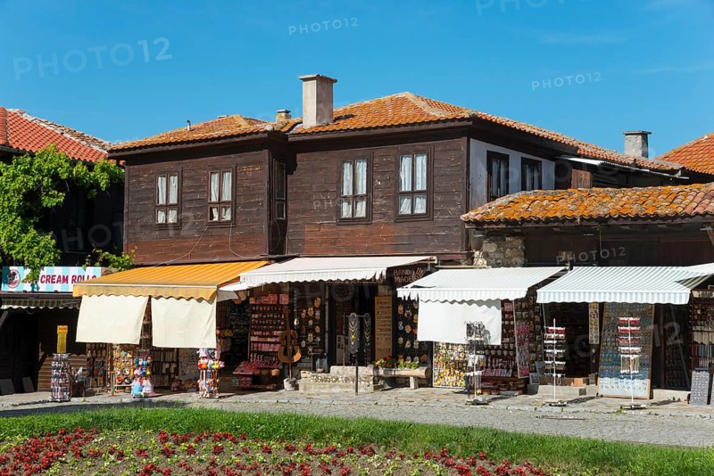 Traditional brown wooden house with souvenir shop and red roof tiles, Black Sea, Nesebar, Nessebar, Burgas, Bulgaria, Europe