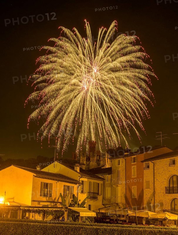 Fireworks from the Scaliger castle in the foreground Houses of, Borghetto, Valeggio sul Mincio, Province of Verona, Italy, Europe