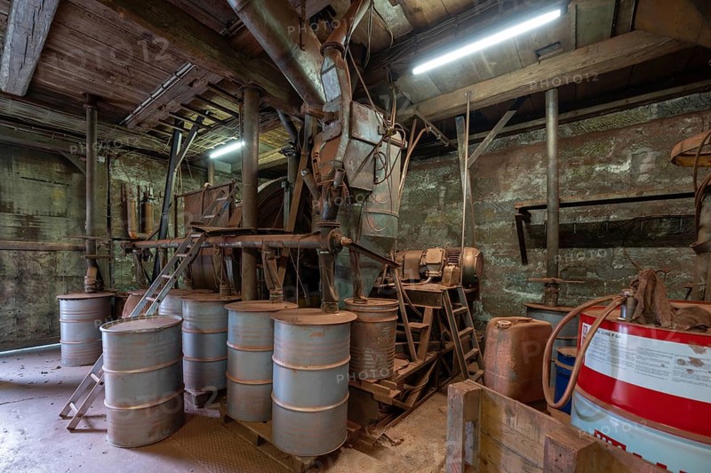 Metal barrels in the bronze powder filling room of a metal powder mill, founded in 1900, Igensdorf, Upper Franconia, Bavaria, Germany, Europe