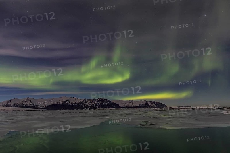 Northern Lights, Aurora borealis over glaciers and Jökulsarlon, Vatnajökull, Iceland, Europe