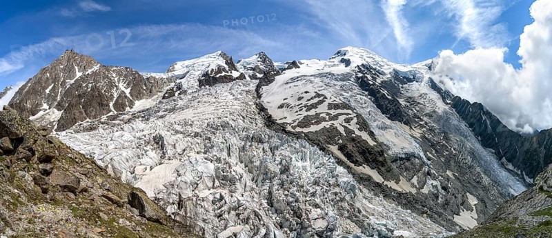 High alpine glaciated mountain landscape, La Jonction, Glacier des Bossons meets Glacier de Taconnaz, summit of Aiguille du Midi, Mont Maudit and Mont Blanc, Chamonix, Haute-Savoie, France, Europe