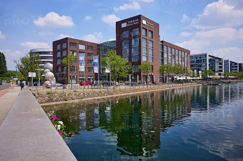 Head office and main cash desk of Volksbank Rhein-Ruhr and office building by the bridge at the inner harbour in Duisburg, Ruhr area, independent city, North Rhine-Westphalia, Germany, Europe
