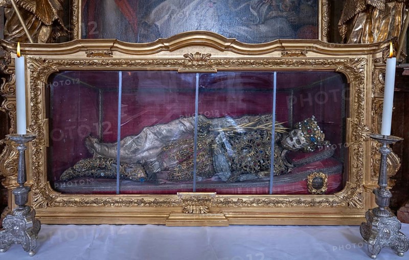 Magnificent glass shrine with decorated bones of a catacomb saint, Basilica of St Mauritius, Niederaltaich, Lower Bavaria, Germany, Europe