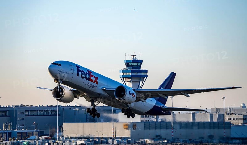 FedEx cargo aircraft, Boeing 777-FS2, taking off at Cologne-Bonn Airport, North Rhine-Westphalia, Germany, Europe