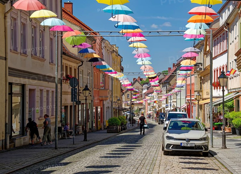 Colourful umbrellas as city decoration, old town of Eisenberg, Saale-Holzland district, Thuringia, Germany, Europe