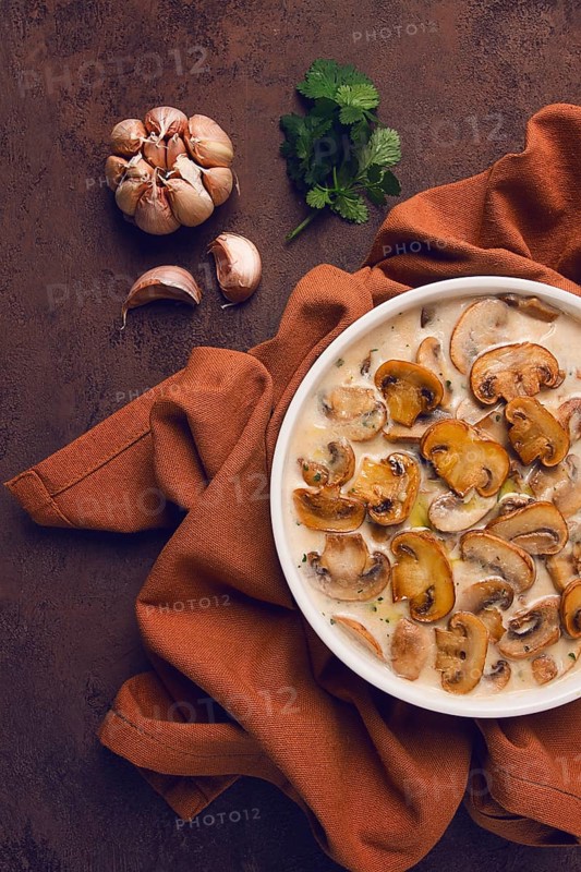 Mushrooms in creamy garlic sauce, with herbs and spices, gravy, sauce, no people