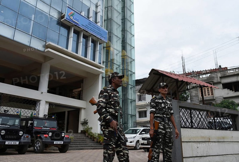 Security personnel in front of the NRC office on July 29, 2018 at Bhangagarh in Guwahati, Assam, India on Sunday. The final draft of Assam's National Register of Citizens (NRC) will be published 30th July