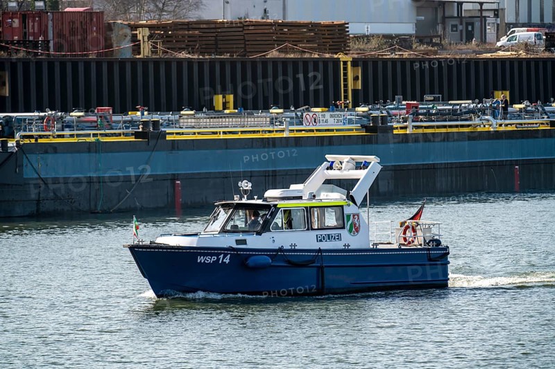 Essen water police boat, on the Rhine-Herne Canal, at Essen city harbour North Rhine-Westphalia, Germany, Europe