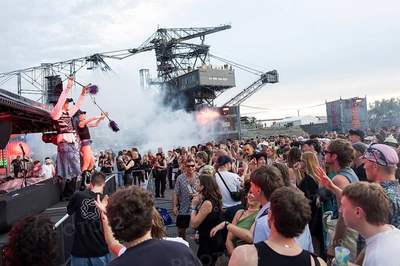 Celebrating visitors in front of excavators at the Melt Festival in Ferropolis on 12 July 2024. After a total of 27 years, the festival will take place for the last time in 2024