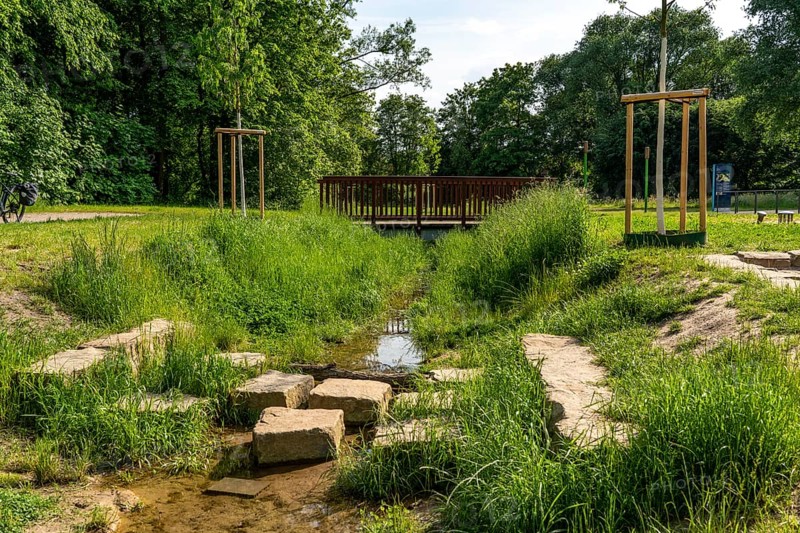 The Katernberger Bach, for over 40 years the stream was piped, 1.2 km long, underground, used as a sewage water, as part of the Emscher conversion, the stream was opened, separated from the waste water and renaturalised, as a green recreational area, Essen, North Rhine-Westphalia, Germany, Europe