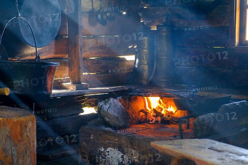 Stube with smoke and fire, South Tyrolean Folklore Museum, Dietenheim, Freilchtmuseum, Pustertal, South Tyrol, Italy, Europe
