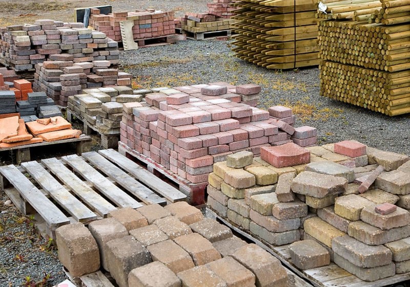 Clay bricks piled up in builder's yard, UK