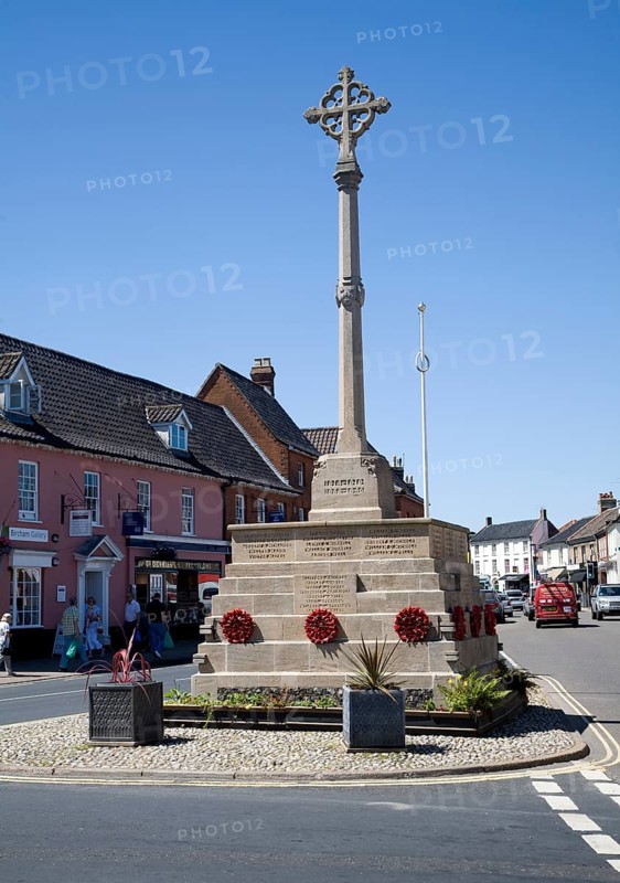 War memorial and historic buildings in the town of Holt, north Norfolk, England, United Kingdom, Europe