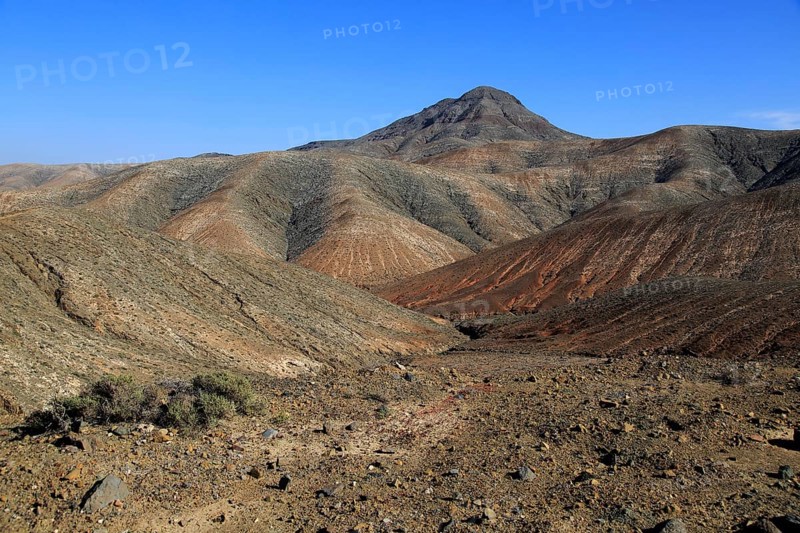 Bare moon-like arid landscape in mountains between Pajara and La Pared, Fuerteventura, Canary Islands, Spain, Europe