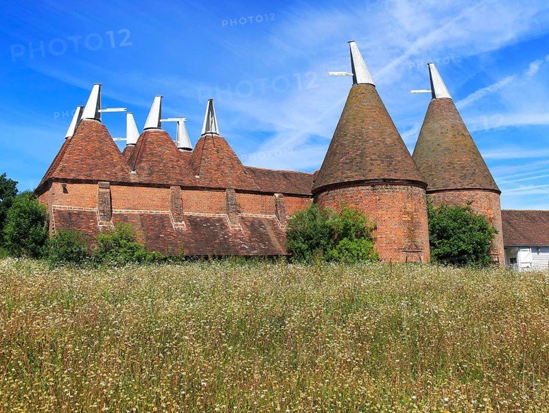 Historic oast house buildings at Sissinghurst castle gardens, Kent, England, UK