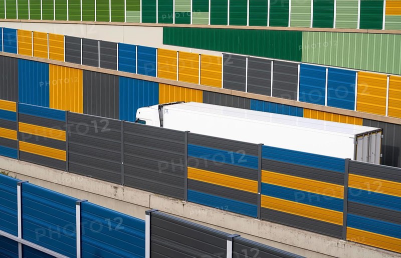 Colourful noise barriers on the A52 motorway, at the Essen-Rüttenscheid junction, the noise barriers were rebuilt in a colourful design as part of the motorway renovation, North Rhine-Westphalia, Germany, Europe