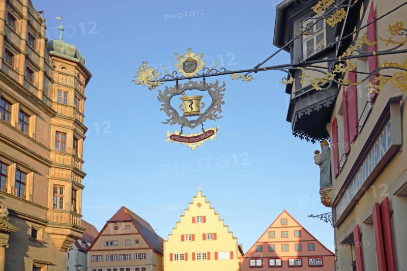 Renaissance town hall and half-timbered house Marien-Apotheke with nose sign on the market square, Rothenburg ob der Tauber, Tauberfranken, Franconia, Bavaria, Germany, Europe