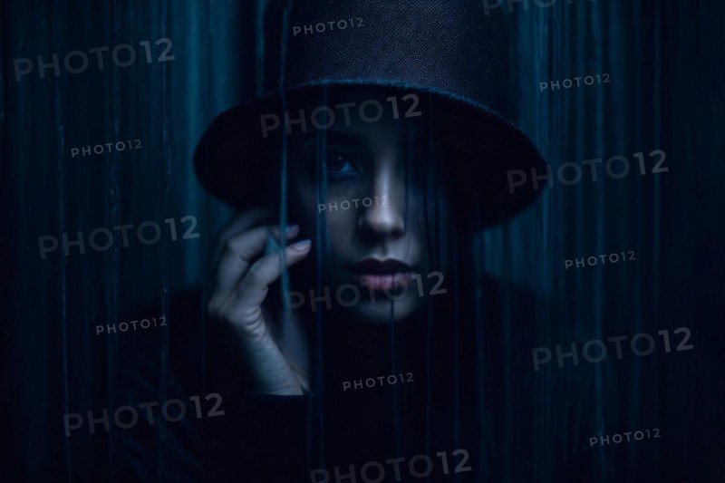 A depressed woman woman is staring with vacant look, AI generated