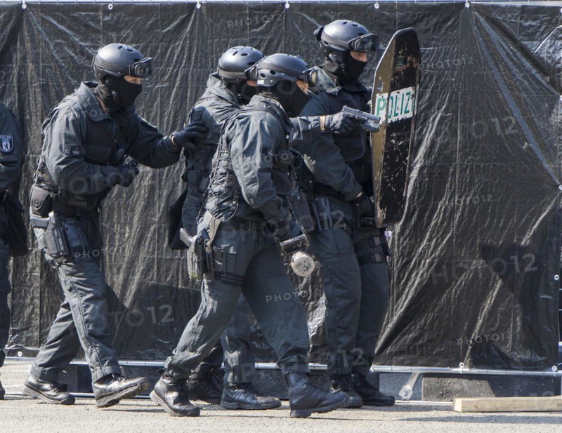 Police officers from the Berlin Special Operations Command, SEK, simulate an attack during an exercise, 11/09/2016