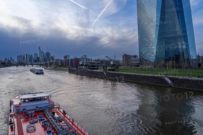 Skyline of Frankfurt am Main, skyscrapers, business and banking district in the city centre, cargo ships, tankers, on the river Main, ECB building, Hesse, Germany, Europe