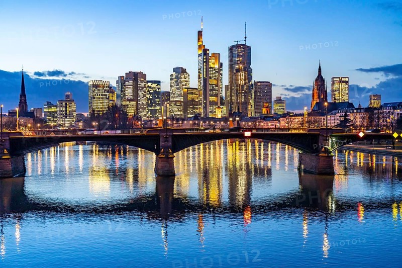 Skyline of the city centre of Frankfurt am Main, river Main, dusk, Ignatz-Bubis-Brücke, Hesse, Germany, Europe