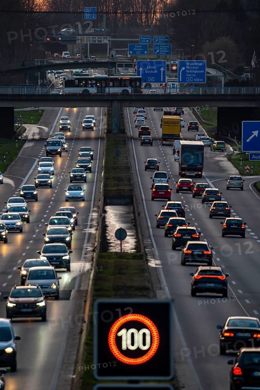 Motorway A40, Ruhrschnellweg, near Bochum, dense evening traffic, in front of the motorway junction Bochum, A43, view in west direction, North Rhine-Westphalia, Germany, Europe