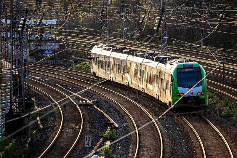 S-Bahn train on the tracks, railway layout, railway line west of the main station of Essen, North Rhine-Westphalia, Germany, Europe