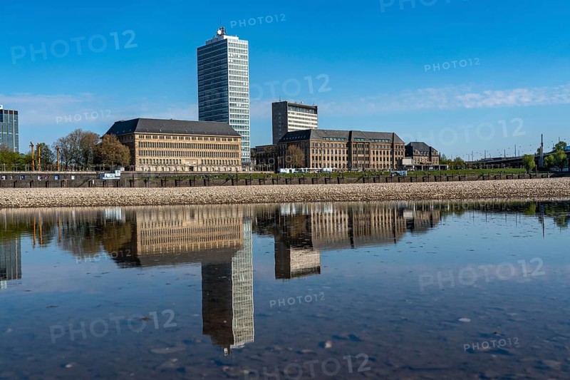Skyline of houses on the banks of the Rhine in Düsseldorf's old town, Vodafone tower block, North Rhine-Westphalia State Chancellery, right, reflection in a water surface on the banks of the Rhine, North Rhine-Westphalia, Germany, Europe