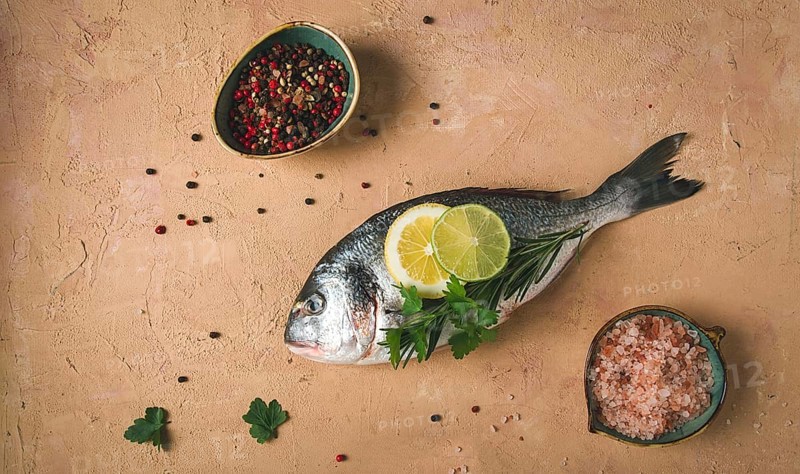 Fresh, raw dorado fish, top view, no people