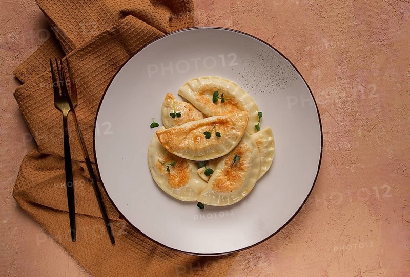 Pierogi, a traditional dish of Polish cuisine, dumplings, top view, close-up, no people