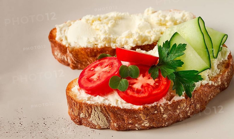 Sandwich, with cream cheese, homemade, on a cutting board, rustic style, no people, selective focus, breakfast