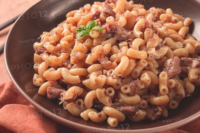 Pasta with stewed meat, pasta in the navy, horns, homemade, no people