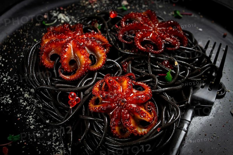 Black spaghetti with baby octopuses, homemade, no people