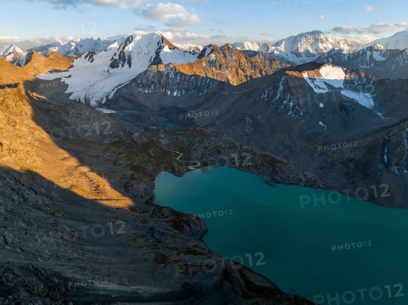 Evening mood, mountain panorama, aerial view, 4000 metre peak with glacier, mountain pass and mountain lake Ala-Kul Lake, Tien Shan, Kyrgyzstan, Asia
