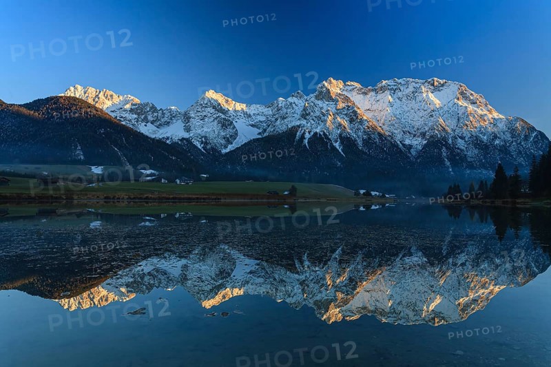 Mountains reflected in lake, evening light, Schmalensee, Karwendel Mountains, Werdenfelser Land, near Mittenwald, Bavaria, Germany, Europe