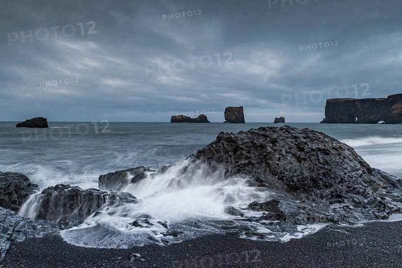 Waves, surf, black beach, lava beach, columnar basalt, rock needles, long exposure, Dyrhólafjara, rock gate Dyrhólaey or Dyrholaey, south coast, Iceland, Europe