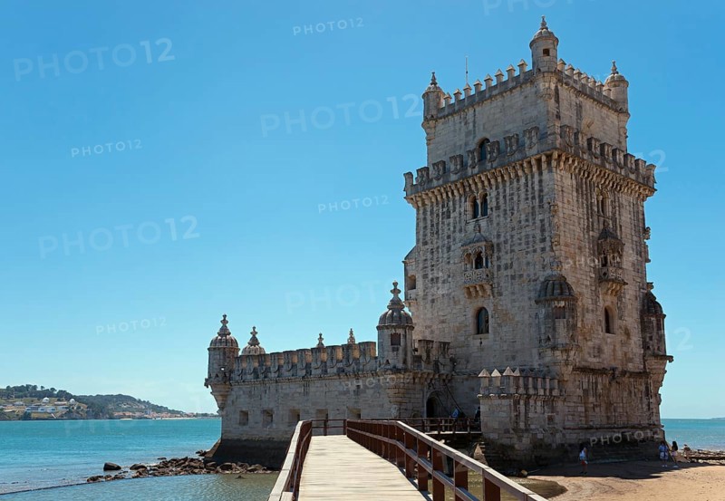Medieval tower stands on a small promontory by the water, Torre de Belém, World Heritage Site, Belem, Bethlehem, Lisbon, Lisboa, Tagus River, Portugal, Europe