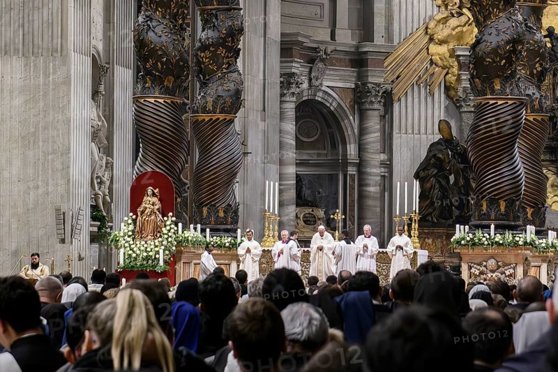Pope Francis prays during Holy Mass in St Peter's Cathedral in the background columns of canopy by Gian Lorenzo Bernini, Vatican City, Vatican, Rome, Italy, Europe