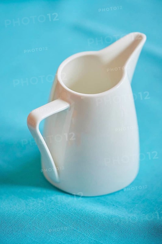 A can of milk standing on a table, Germany, Europe