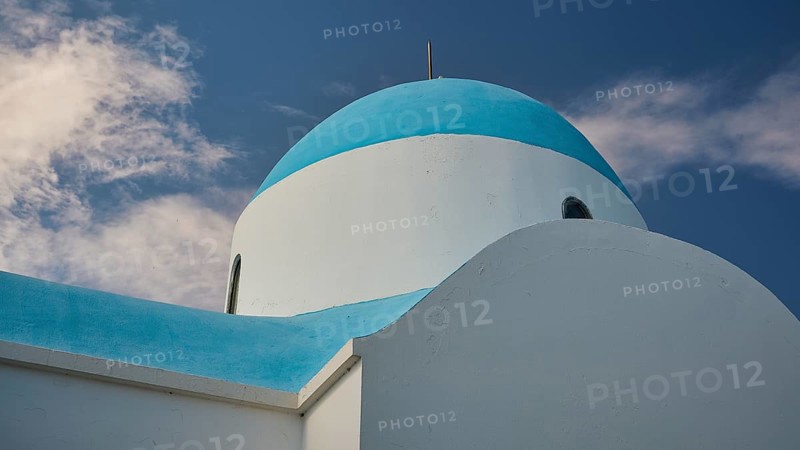 White-blue church with clouds in the background under a blue sky, Church of Profitis Ilias, above Nikia, Nikia, Nisyros, Dodecanese, Greek Islands, Greece, Europe