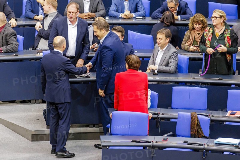 Olaf Scholz (SPD), Federal Chancellor, greets Lars Klingbeil in the plenary chamber in front of the session in the German Bundestag, Berlin, 13 November 2024
