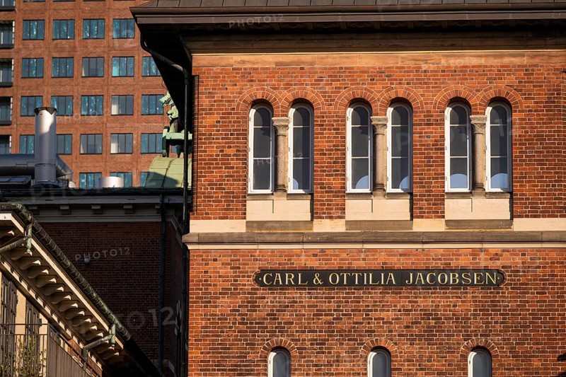 Brick building with inscription, Carl & Ottilia Jacobsen, Danish brewery entrepreneurs, art collectors and benefactors, Carlsbergbygen, Carlsberg neighbourhood, Valby, Copenhagen, Denmark, Europe