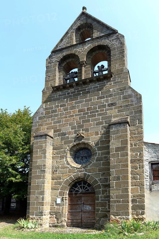 Saint-Pierre church and its distinctive comb bell tower in Arlet, Haute-Loire, Auvergne-Rhône-Alpes, France, Europe